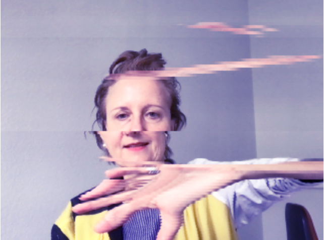 Portrait of Hanna making a hand gesture